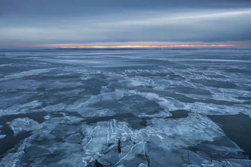 Foto op Plexiglas Frozen Bay of Puck near Kuznica at sunset, Hel Peninsula. Poland © Patryk Kosmider