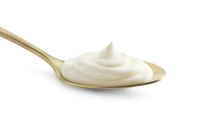 Golden spoon with mayonnaise isolated on white