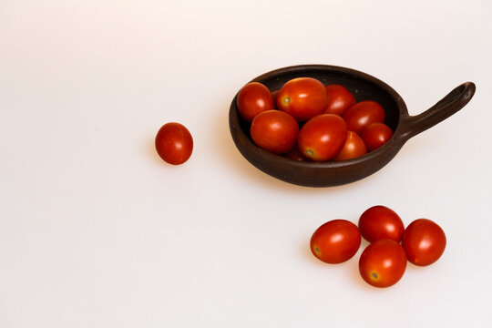 Plum Tomatoes Isolated Close Up On White Background