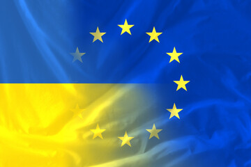 Flags of Ukraine and European Union, double exposure. International diplomatic relationships