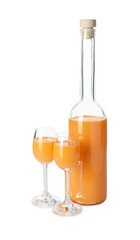 Bottle and glasses with tasty tangerine liqueur isolated on white