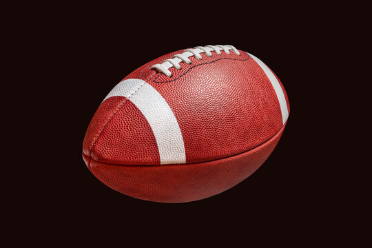 College style leather football isolated on a black background