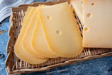 Cheese collection, Dutch ripe hard chees made from cow milk in the Netherlands in piece and sliced