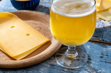 Cheese collection, Dutch ripe hard chees made from cow milk in the Netherlands in cubes and glass...