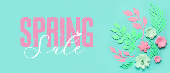 Frame made of paper flowers with leaves on green background