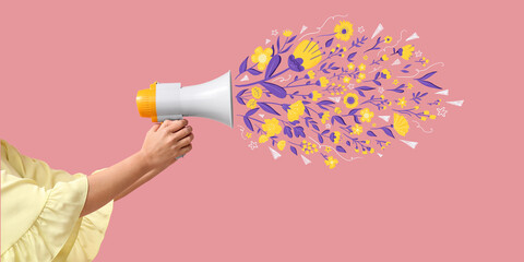 Woman with megaphone and drawn flowers on pink background