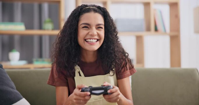 Woman, video game and controller or home or online entertainment, live streaming or winning. Female person, happy and play virtual in apartment or internet competition or level up, challenge or fun