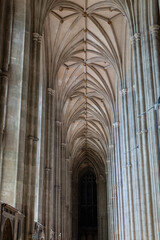 An imposing nave with incredibly high ribbed vaults in Canterbury Cathedral