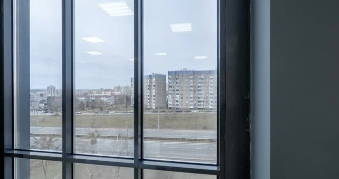 loop rotation and panoramic view in empty modern hall with columns, doors and panoramic windows overlooking the city.
