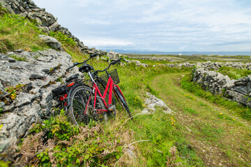 Bikes parked on Inishmore, the largest of the Aran Islands in Galway Bay. Renting a bicycle is one...