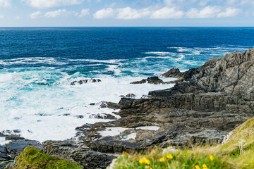 Rough and rocky shore at Malin Head, Ireland's northernmost point, Wild Atlantic Way, spectacular coastal route. Numerous Discovery Points. Co. Donegal