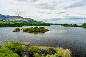 Lough Leane, huge lake located in Killarney National Park, famous of Ross Castle on it's shore,...
