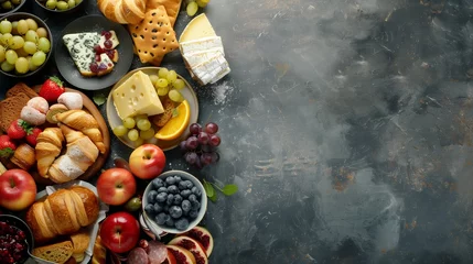 Foto op Plexiglas A delectable continental breakfast spread captured from above, featuring an array of pastries, fruits, cheeses, and more, with generous copy space to evoke the essence of a delightful morning feast. © Dave