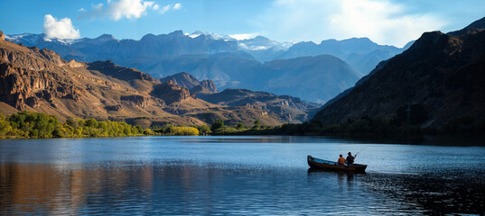 Fishing from a rowboat on a scenic southwestern desert mountain lake