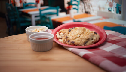 traditional Salvadoran cuisine in a colorful restaurant, featuring delicious pupusas with flavorful toppings and condiments.