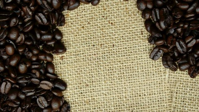 Coffee beans in burlap bag. Concept for coffee culture. and business. Slow motion macro dolly tracking shot. selective focus. 4k