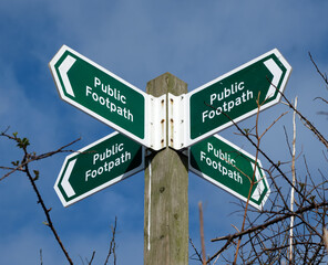 A four-way public footpath sign near West Down, Devon, England.