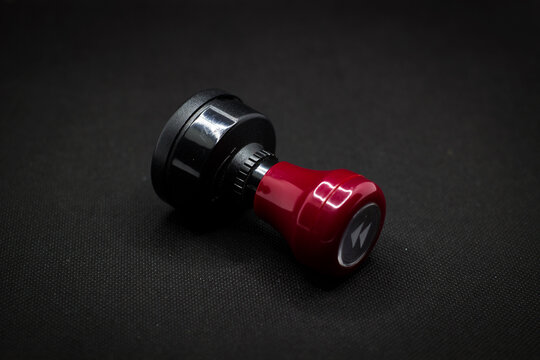 Red handle stample isolated on black background 