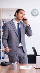 Unhappy male businessman in the office