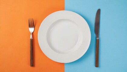 Empty wite plate on orange and blue pastel background. Top view with copy space.