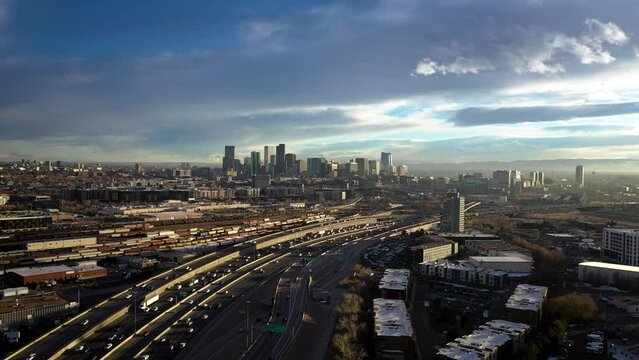 Downtown Denver, Colorado at Sunset with Rail Yard and Traffic