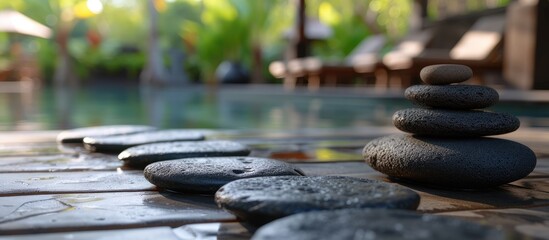 Relaxing spa experience with warm basalt stone massage in serene luxury resort.
