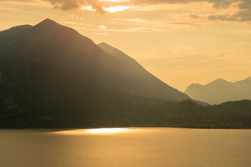 Mountain landscape, picturesque mountain lake in the summer morning, panorama, landscape with fabulous lake view from the top of the mountain. Como, Italy
