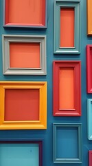 multiple colorful frames hanging against a blue wall