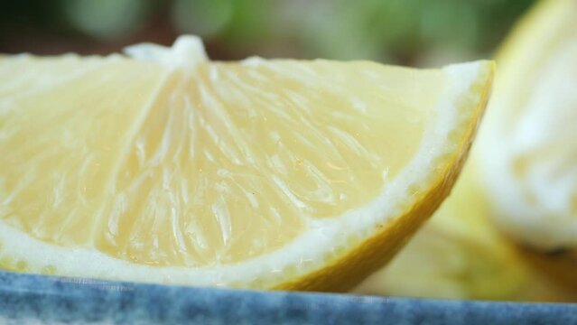 closeup of slice of lemon on a plate 