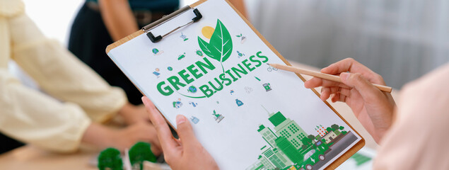 Green business project was presented by green business team at meeting room. ESG environment social...