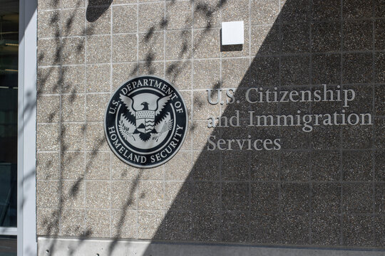 Portland, OR, USA - Apr 7, 2022: The U.S. Citizenship and Immigration Services (USCIS) sign is seen outside of the USCIS Field Office in Portland, Oregon.