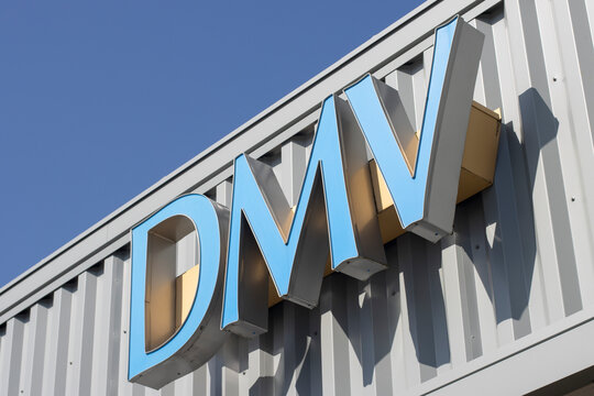 Lake Oswego, OR, USA - May 20, 2023: Closeup of the DMV sign seen outside of the Department of Motor Vehicles (DMV) office in Lake Oswego, Oregon.