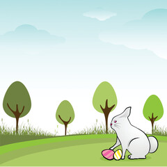 Cute Bunny with Painted Egg on Green Nature Background for Happy Easter Concept.