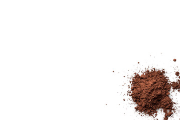 Organic dark chocolate powder isolated on a transparent background with shadow from above, top view