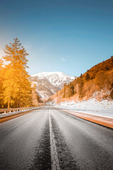 Country road in winter mountains