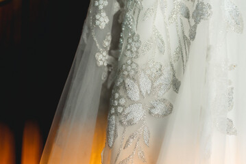 Close up of a  wedding dress or bridal gown, the dress worn by the bride during a wedding ceremony.