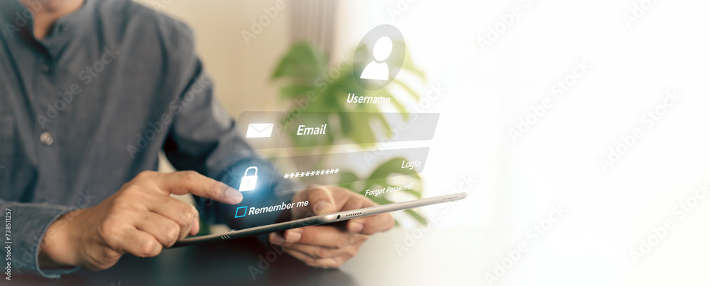 Fototapete hand touching login username and password icon for safety internet security access or user sign regi