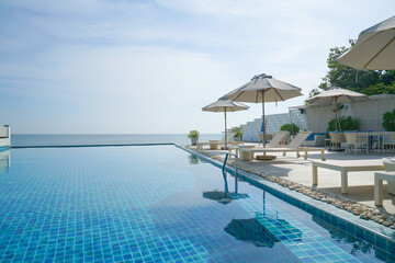 bed pool around swimming pool with sea background