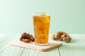 Delicious sweet drink tamarind juice and ice cube