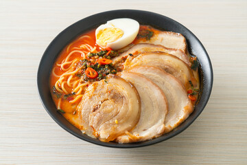 Ramen Noodles Spicy Tomyum Soup with Roast Pork