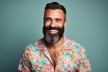 Portrait of a handsome man with beard and mustache on blue background - obrazy, fototapety, plakaty