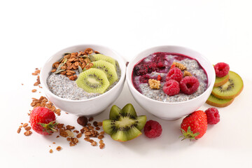 bowl of chia pudding with fresh fruits isolated on white background