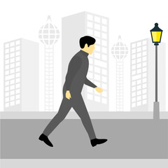 Silhouette of a man walking in the city