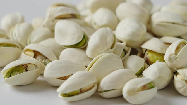 roasted salted pistachio nuts background.