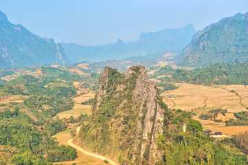 Fototapeta na wymiar Vang Vieng , Laos : 16 Feb 2024 :Beautiful scenery from Nam Xay viewpoint, Vang Vieng, Laos. During the dry season in Laos.