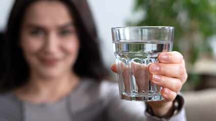 young woman drinking water