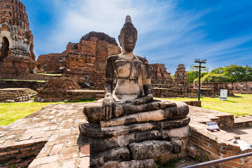 Ayutthaya,Thailand - September,17, 2023:  Broken Buddha statues in Wat Mahathat, Ayutthaya, Thailand