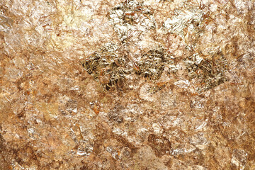 Gold leaf texture or background. Texture of the gold leaf gilded on buddha.