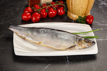 Whole raw salted herring fish