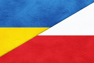 Flags of Ukraine and Poland on textured background. International diplomatic relationships